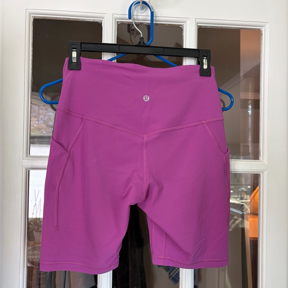 Lululemon Athletica fuchsia biker shorts with pockets